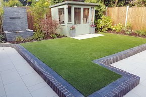 Artificial Lawn; summer house; waterblade feature controlled by remote;